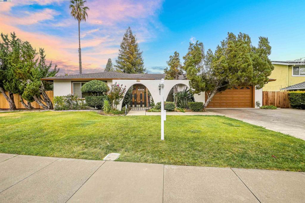 Spectacular single-story executive home in the desirable Northgate neighborhood! Situated on a generous 0.27-acre lot, this 5-bedroom, 2.5-bath residence is just steps from Northgate High, Walnut Acres Elementary, and Foothill Middle School. The home has been refreshed with brand-new flooring, fresh interior and exterior paint, an expanded newly painted patio, and updated fencing in select areas. Designed with entertaining in mind, the spacious yard offers numerous mature fruit trees and ample space to create your own vegetable garden. Ideally located near Orchard Shopping Center, Whole Foods, BART, and major freeways, this home also provides easy access to the Ygnacio Canal Trail and is just minutes from the local fire station. A rare opportunity to own a beautifully updated, one-level home in one of Walnut Creek’s most sought-after communities!