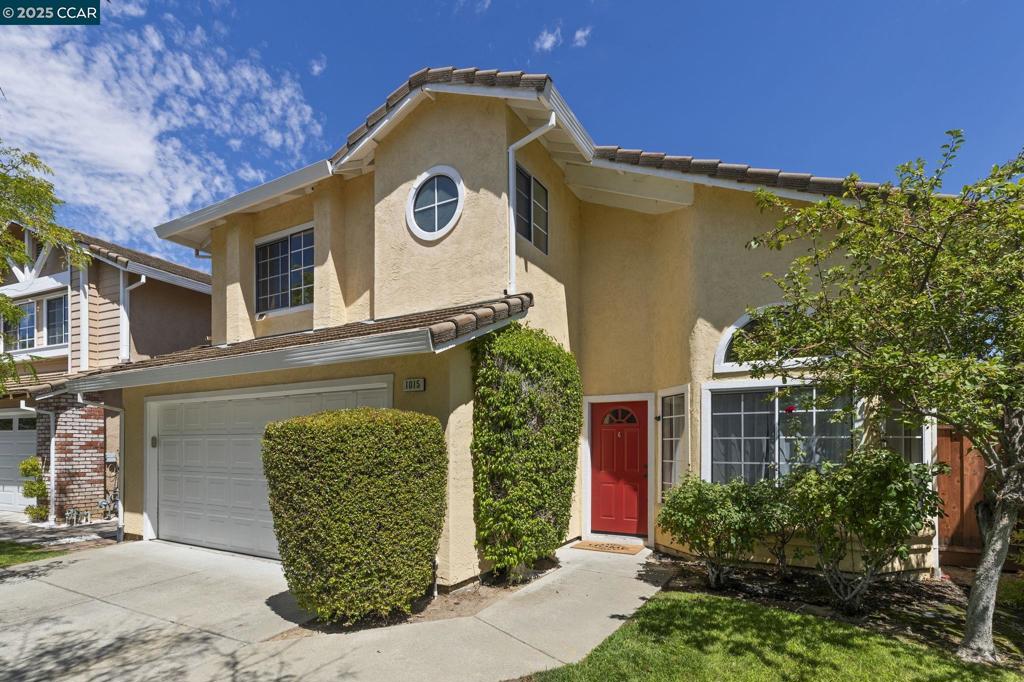 Tucked away on a quiet cul-de-sac in Concord’s desirable Live Oak community, this stunning 3-bedroom, 2.5-bath home offers 1,607 sq. ft. of stylish, functional living. Soaring vaulted ceilings, recessed lighting, and abundant natural light create a warm, open atmosphere, while the upgraded kitchen boasts granite countertops, a spacious layout, and included stainless-steel refrigerator and appliances—perfect for cooking and entertaining. Enjoy separate living and family rooms, a bright dining area, and fresh updates throughout, including laminate and tile flooring, brand-new plush carpet, and neutral paint. The serene primary suite features a luxurious tub for the ultimate in relaxation. Additional highlights include an attached 2-car garage, dual-pane windows, newly installed central heat and air, and included washer and dryer. Step outside to a beautifully landscaped backyard with bistro lighting ofer the private patio—ideal for gatherings. Just across the street, enjoy community amenities including a sparkling pool, clubhouse, and playground. All this in a peaceful neighborhood with convenient access to shopping, dining, and commuter routes makes this home a must-see!