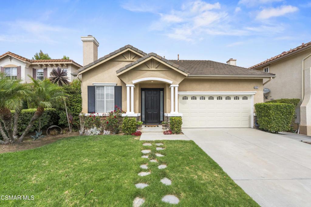Welcome to this beautifully maintained 3-bedroom, 2-bathroom home with a spacious loft, offering 2,200 sq. ft. of comfortable living in the highly desirable Dos Vientos community of Newbury Park.Charming curb appeal greets you, while inside an inviting open floor plan showcases soaring vaulted ceilings, freshly painted interiors, recessed lighting, and dual-pane windows throughout. Upgraded wood and tile flooring add warmth and elegance to the living spaces. The family room features a cozy fireplace, perfect for relaxing evenings.The heart of the home features an open kitchen concept with updated stainless steel appliances, a center island with breakfast bar seating, and abundant cabinetry. The generous primary suite offers a true retreat with an ensuite bathroom and a large glass slider opening directly to the backyard. Two secondary bedrooms with ample closet space, a full guest bathroom, and a convenient laundry room with storage and direct garage access complete the main level.Upstairs, the inviting loft offers versatile living space--ideal for a home office, gym, playroom, or media area.Step outside to enjoy the spacious backyard with a large grassy area, perfect for entertaining, gardening, or simply soaking up the California sunshine.Centrally located near award-winning schools, shopping, dining, hiking, and more--this Dos Vientos gem blends comfort, style, and convenience. Welcome home!