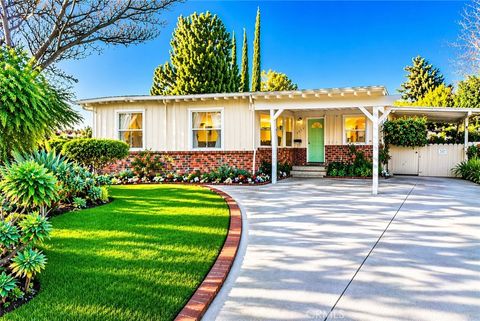 Photo of 17451 Tulsa St, Granada Hills, CA 91344 (MLS # SB26044813)