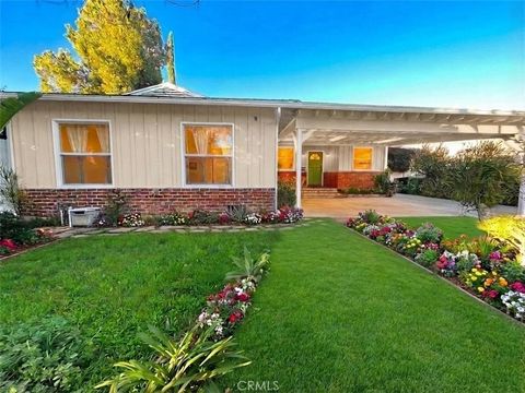 Photo of 17451 Tulsa St, Granada Hills, CA 91344 (MLS # SB26044813)