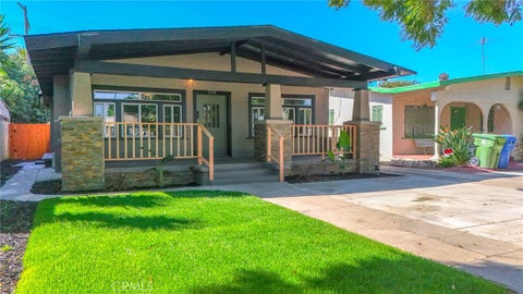 Photo of 1650 W 38th Place, Los Angeles, CA 90062 (MLS # DW26199544)