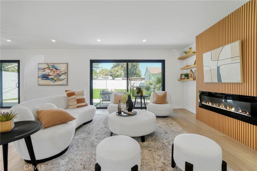 Welcome to this spacious and inviting REMODELED 4-bedroom, 2-bathroom single-story move-in ready home, this home offers a comfortable layout with plenty of natural light, storage and upgrades with laminate floors, recess lights throughout the entire home.

The upgraded kitchen features quartz countertops with an Island, stainless steel appliances including refrigerator, stove, microwave, and dishwasher, abundant cabinet space with washer and dryer for convenience. The formal dining room and living room have new laminate flooring and the cozy fireplace creates the perfect gathering space. All bedrooms are spacious, while the primary suite boasts two closets and a gorgeous updated bathroom, The guest bathroom also updated features a walk-in shower.

Additional features include copper plumbing, central air and heating,  a large fenced backyard with new landscaping, with a spacious patio for entertaining, a detached two-car garage with rear access and Perfect ADU potential. 

This well-maintained property blends comfort, functionality, and curb appeal—perfect for those seeking a welcoming home in a prime neighborhood setting.