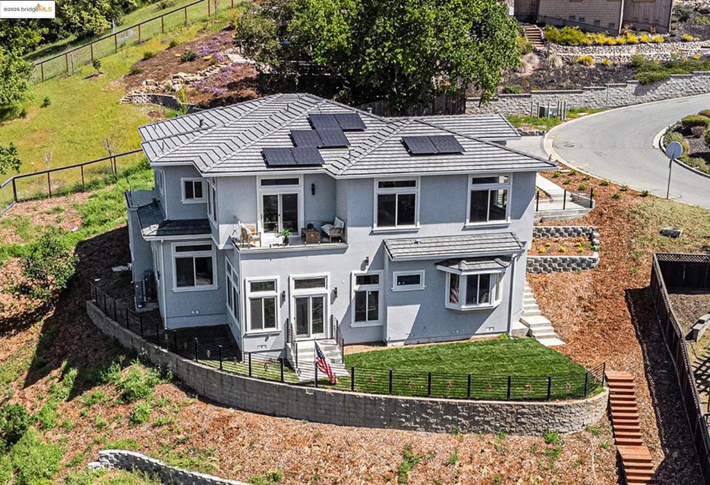Welcome to this stunning 2025 new built home in the heart of Lafayette hills. 130 Arbor View Lane is truly one of a kind custom built home with views galore. Nestled in the prestigious gated community, total of 9 homes in all & only 1 lot remains. Beautifully architected contemporary designed with every detail in mind. Walk into a massive family room/w fireplace next to formal dinning area. One of a kind kitchen with updated appliances & nice fixtures in ever corner. So much natural light from the Anderson windows in every room brings the nature to you. Huge primary bedroom with walk in closet & a bathroom that has everything one could want. The other bedrooms are all junior suites with views and each come with its own unique custom full bathrooms designed with heart & mind. The materials used to build this home was the absolute highest of quality products available, from the mahogany hardwood flooring throughout the home to the top quality tiles used in bathrooms & all other wet areas. Multiple balconies with views of the hills or woods. Large tiered yard spaces & side yard. Plenty of parking spaces for guests in addition to the 2 car garage. There is solar owned that comes with this home & also additional wall wiring for tech gadgets etc. Great NEW price on this brand new home!