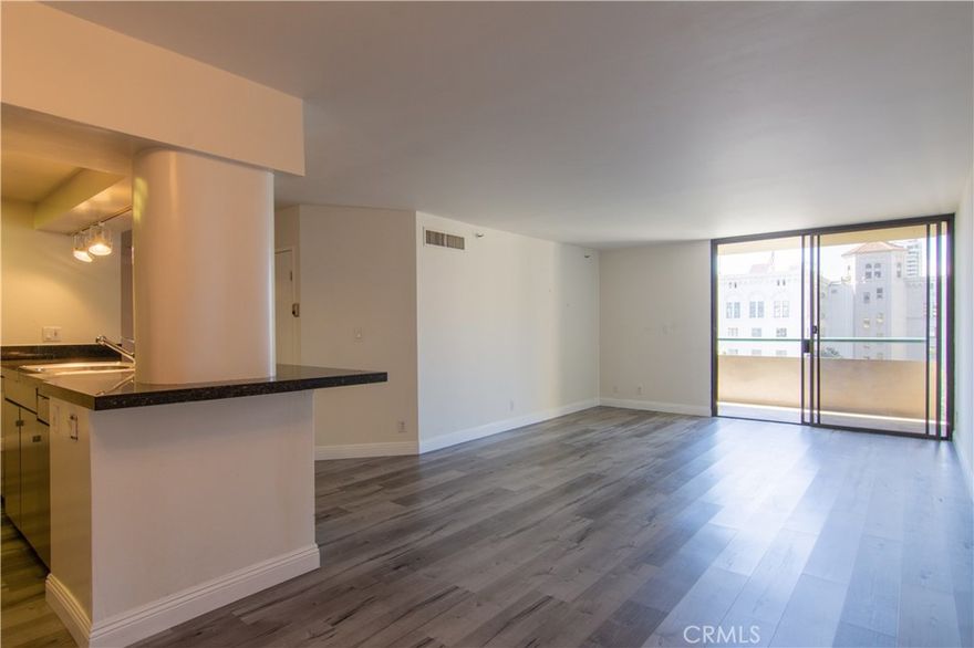2 Bedroom 2 Bath modern unit with balcony, hardwood floors and renovated bathrooms. Water included in rent. Access to dining and groceries are unmatched, with Starbucks and Panini Bar/Grill on the ground level of the building, as well as the Ralph's Fresh Fare directly across the street. Additional Bldg. amenities include: pool, jacuzzi, gym, controlled access with 24/7 Security, Reception lounge on every floor; 2 under-ground parking spaces (side-by-side), handball/racquet ball court, and a community room. The unit also comes with washer and dryer, and dry cleaner is located on the ground level.