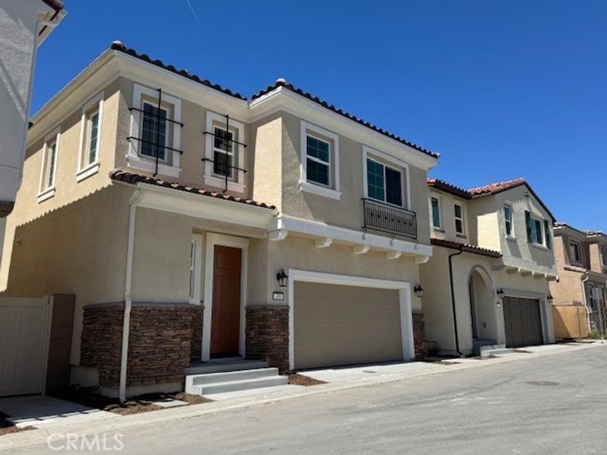 Welcome to Rose Glen, Upland's newest gated community, this unit is located in the center of the community, has the mountain and park view. This unit presents 1,619 sq. ft. of well-planned living space that perfectly balances efficiency and comfort. With 3 bedrooms and 2.5 baths, this delightful home is ideal for families looking to expand or those who simply desire extra room. The main floor's open-concept design beautifully connects the living and dining spaces, making it perfect for cozy weekends or family get-togethers. All-Electric Home: Step into a modern lifestyle with sustainability and energy efficiency at its core. Owner's Suite: Pamper yourself in a luxurious suite complete with dual sinks, a separate tub and shower, and a spacious walk-in closet. Relish in the elegance of gray cabinetry, quartz countertops with a full tile backsplash, Shaw LVP flooring, Shaw carpet, and brushed nickel Kohler fixtures. The community also includes a tot lot and exercise equipment, ensuring fun and fitness for all residents. Solar panel systems was paid off to save your electricity bill?  Whirlpools refrigerator, washer and dryer are included in the rental. EV charger outlets is available in the two car attached garage. The RPO also installed the blinds .