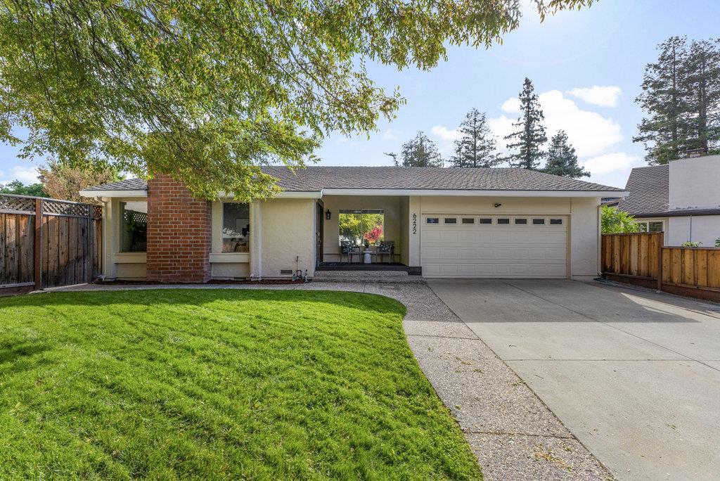 Beautifully updated ranch home on a quiet Almaden Valley cul-de-sac, where turnkey comfort meets indoor/outdoor living. An inviting front yard with a covered porch and lawn sets the tone. A designer front door with sidelights opens to a dramatic sunken living room with cathedral ceilings and a brick-clad fireplace. The convenient U-shaped kitchen with smart prep zones opens to the dining/family room for easy everyday connection. Fresh interior/exterior paint provides an ideal backdrop, while new LVT flooring runs throughout for a warm, cohesive finish. Updated bathrooms elevate the feel, and the primary suite offers a spa-like bath plus direct deck access for serene mornings. Sliding doors lead to a private resort backyard anchored by a stunning black-bottom pool. Redwood decks off the family, living, and the primary extend daily living for entertainging or just relaxing. Front and back lawns add flexible space for play, pets, and gardening. A new high-efficiency HVAC system keeps comfort steady year-round. Minutes to parks, trails, schools, and shops, with easy Silicon Valley access. Top rated SJ Schools: Los Alamitos Elementary, Castillero Middle, Pioneer High. Fresh, contemporary & perfectly placed, updated, inviting, and ready to enjoy 6222 Abbeyfield has it all.