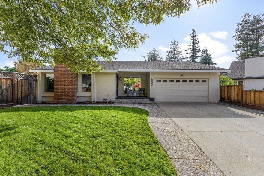 Beautifully updated ranch home on a quiet Almaden Valley cul-de-sac, where turnkey comfort meets indoor/outdoor living. An inviting front yard with a covered porch and lawn sets the tone. A designer front door with sidelights opens to a dramatic sunken living room with cathedral ceilings and a brick-clad fireplace.  The convenient U-shaped kitchen with smart prep zones opens to the dining/family room for easy everyday connection. Fresh interior/exterior paint provides an ideal backdrop, while new LVT flooring runs throughout for a warm, cohesive finish. Updated bathrooms elevate the feel, and the primary suite offers a spa-like bath plus direct deck access for serene mornings. Sliding doors lead to a private resort backyard anchored by a stunning black-bottom pool. Redwood decks off the family, living, and the primary extend daily living for entertainging or just relaxing. Front and back lawns add flexible space for play, pets, and gardening. A new high-efficiency HVAC system keeps comfort steady year-round. Minutes to parks, trails, schools, and shops, with easy Silicon Valley access. Top rated SJ Schools: Los Alamitos Elementary, Castillero Middle, Pioneer High. Fresh, contemporary & perfectly placed, updated, inviting, and ready to enjoy 6222 Abbeyfield has it all.