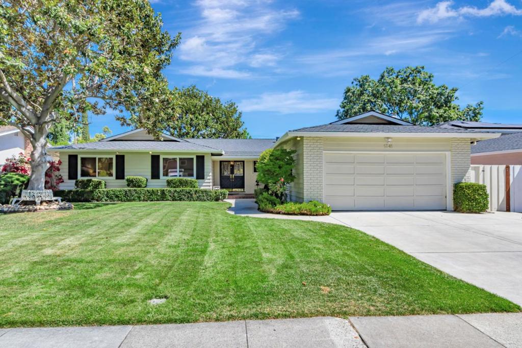 This beautiful ranch home on Campbell Ave is dazzling the moment you enter it. From the formal entry you are drawn to the magnificent living room and its cathedral ceiling and fireplace, all with a view into the newly landscaped rear yard. Next to the spacious living room (with room for dining) is the secondary living and kitchen/dining area that has the access to the rear yard. All four bedrooms are on the same side of the home and include two newly remodeled bathrooms, the guest bath & Primary bath. The 3rd updated bathroom is off the kitchen and full size laundry/mud room. The rear yard has plenty of room for dining, playing and entertaining with its low maintenance features. No expense was spared when bringing new life to this home. This original owner had this home custom built years ago. You are going to love this home...Come see for yourself! Close to the shopping, dining and entertainment at the Pruneyard.