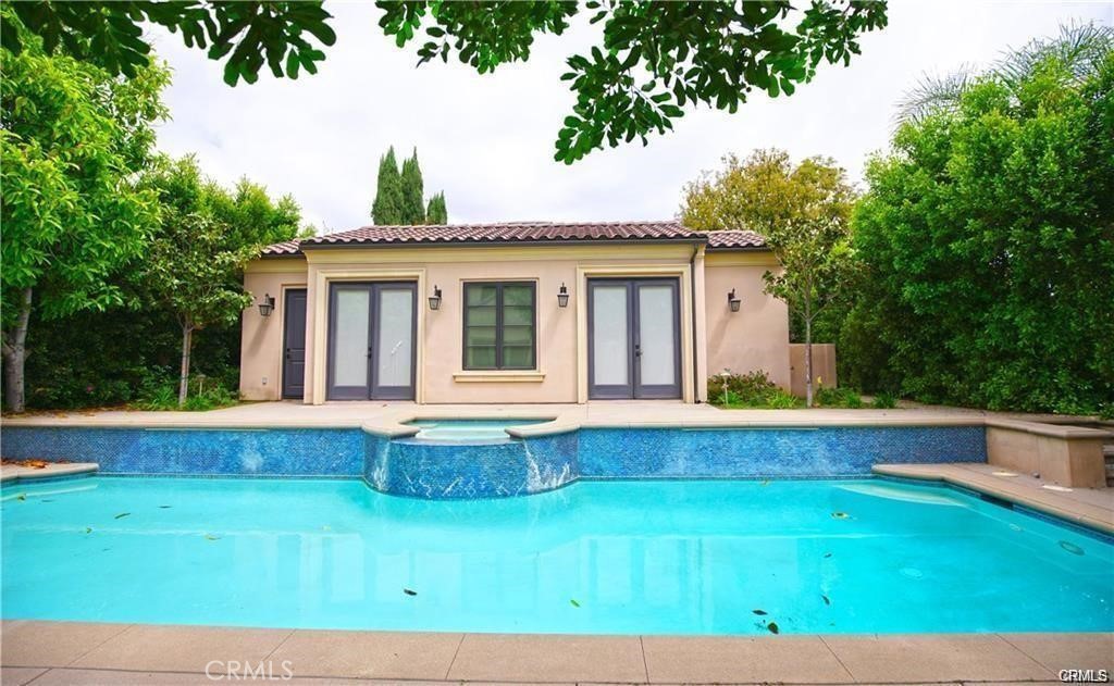 Built in 2015, this beautifully maintained guest house offers a private and stylish retreat in the heart of Arcadia. The bright living room boasts high ceilings, rich wood flooring, recessed lighting, and an elegant fireplace, creating a warm and inviting ambiance. An open loft design includes a sleek wet bar with granite countertops, a breakfast bar, glass cabinets, and a built-in wine cellar. Additional highlights include a full bathroom, a window-unit air conditioner, and a ceiling fan for year-round comfort. Enjoy your private gated entrance, beautifully landscaped yard, and access to a sparkling swimming pool. Ideally located near supermarkets, shops, and restaurants. Move-in ready with all utilities included.