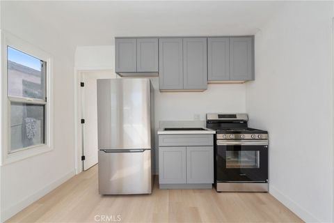 Photo of 242 E 84 TH Pl, Los Angeles, CA 90003 (MLS # DW26069772)