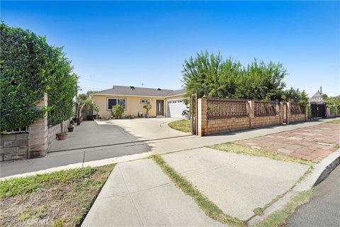 Photo of 19406 Enadia Way, Reseda, CA 91335 (MLS # SR26178175)