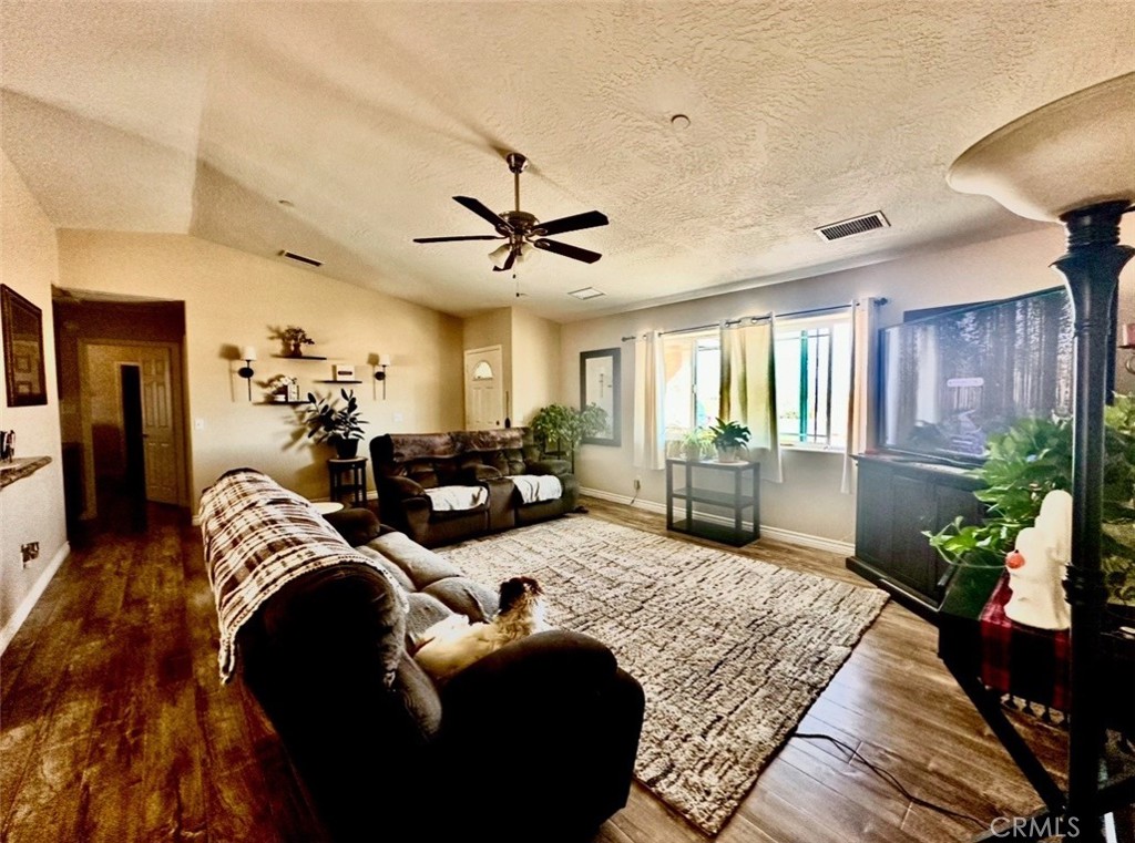 Welcome to this beautiful turnkey Apple Valley home with stunning mountain views and a desirable split floor plan. Offering 3 bedrooms and 2 bathrooms, this home showcases upgraded flooring, granite countertops throughout, and dual-pane windows for both style and energy efficiency. Natural light fills the inviting living spaces, creating a warm and comfortable atmosphere.
Sitting on nearly half an acre, the property boasts a spacious backyard with endless possibilities for entertaining, gardening, or simply relaxing and enjoying the High Desert sunsets. Conveniently located near schools, shopping, and outdoor recreation, this home is the perfect blend of comfort, convenience, and lifestyle. Truly move-in ready and waiting for its next owner!