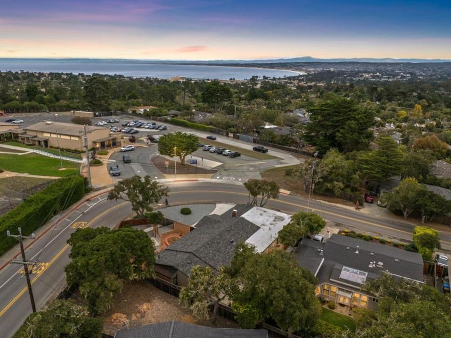 Superb Monte Regio 2,048sqft remodel located on an elevated 8,200sqft sweeping corner lot adjacent to open space and unobstructed ocean views with multi-directional natural light flow throughout the day.  Thoughtfully finished with all new wide plank wood flooring, custom paint, generous open concept living/dining area with cozy fireplace, updated Chefs Stainless Kitchen with quartz counters, full backsplash, under cabinet lighting, water line for fridge and corner view breakfast nook with breakfast bar island. Off the breakfast nook is the laundry area with updated powder room. Generous primary suite with walkout garden access, atrium bathroom adjoined with a luxurious cedar walk-in changing room/closet.  3 large guest rooms including walkout garden access, custom tiled guest bathroom. New tankless water heater/furnace/200Amp service/fencing and epoxy garage flooring.  Relax in your private and expansive west facing outdoor living space beautifully finished with extensive terraced brickwork and soothing ocean views.  This compound style lot may have ADU possibilities. Convenient to vibrant Soledad & Del Monte shopping centers, Schools, Veterans Memorial Park, hiking trails, Pacific Grove, Via Paraiso Park, downtown Monterey restaurants, shops, entertainment and Downtown Carmel.