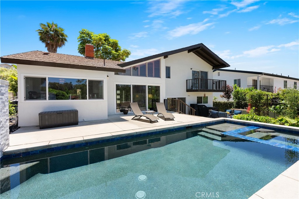 Welcome to 26511 Naccome Drive, a meticulously maintained pool home in the heart of Mission Viejo that blends modern upgrades with timeless charm. This spacious 2,115 square foot residence sits on an expansive 8,448 square foot lot, offering 3 bedrooms and 2 bathrooms, with the flexibility to easily convert the downstairs office area into a 4th bedroom. The current laundry room can also be converted back to its original half bathroom, providing even more versatility for your lifestyle. Inside, the home has been thoughtfully updated throughout. The kitchen showcases sleek quartz counters and stainless steel appliances, while the bathrooms feature upgraded flooring and granite countertop vanities. New waterproof, pet-proof, and stain-resistant laminate flooring runs through the living spaces, complemented by crown molding, custom shutters for the vaulted living room window, and new interior doors. Energy-saving sliders in the secondary bedrooms and nearly all new windows bring in abundant natural light while improving efficiency. The upgrades continue with a copper re-pipe, a new 200-amp breaker box ready for solar, updated lighting and ceiling fans, and a freshly stuccoed facade above the garage for enhanced curb appeal. Step outside and you’ll find a true backyard retreat with a sparkling pool and spa surrounded by drought-resistant landscaping. Along the privacy wall and atrium, the landscaping has been thoughtfully enhanced, and a unique micro-homestead offers raised garden beds filled with organic soil, a greenhouse, a GreenStalk vertical planter, and three mature boysenberry vines—perfect for those who enjoy gardening or farm-to-table living. This Mission Viejo gem combines comfort, style, and functionality with energy-conscious features and plenty of outdoor living space. Plus, this home is zoned for the award-winning schools of Saddleback Valley Unified School District, and has access to the boating, fishing, beaches and concerts at Lake Mission Viejo. Don’t miss the opportunity to call this exceptional property your home.