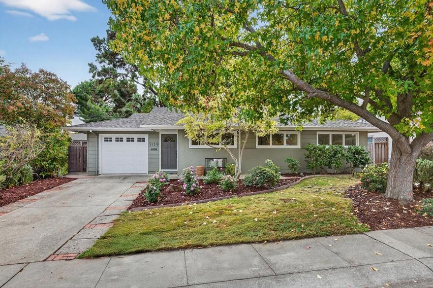 Perfectly situated on the border of Los Altos with easy access to both downtown Los Altos and Mountain View, this charming home boasts a fabulous great room design, light-filled bedrooms, fresh updates, and a private park-like yard. The open living spaces sit at the back of the home beneath soaring vaulted ceilings and feature a wall of windows overlooking the lush yard, a stacked stone fireplace, airy dining room, and a kitchen with stunning granite countertops. Three bedrooms have views of the front of the home, cedar-lined closets, and enjoy easy access to the hall bath. Outside, a magnificent pine tree provides shade to the freshly landscaped yard complete with manicured plantings, a large concrete entertaining patio, and level lawn for play. Entirely move-in ready, and close to wonderful amenities, acclaimed local schools, tech employers, and commute routes.