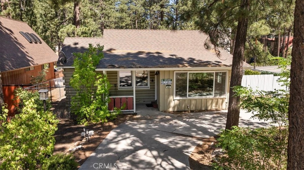 Charming Mountain Retreat with Casita, Hot Tub & Game Room – Prime Big Bear Lake Location!
Located just minutes from the Village, Ski Beach Park and Meadow Park, this versatile property offers a spacious 2-bedroom, 2-bath main house PLUS a private 1-bedroom, 1-bath casita, ideal for guests, rental income, or a private retreat.
Step inside the main home and be greeted by a bright and airy living room featuring a large picture window with neighborhood views and a cozy fireplace for those chilly mountain evenings. The open-concept layout flows nicely with a built-in buffet and a beautifully updated kitchen with butcher block countertops open cabinets and plenty of storage.
The casita features its own private entrance, a generous living space that includes one bedroom, a full bath, and room for a kitchenette — refrigerator included, and a separate private driveway — this space definitely offers flexibility for guests or extended stays.
On the back patio you can unwind under the stars in your Hot Springs 6-person hot tub, gather around the fire pit. The circular driveway offers plenty of parking, and the 2-car garage with its own private driveway has been transformed into a fun-filled game room complete with a pool table, darts, and basketball hoop.
This home offers comfort, functionality, and the ideal location — whether you're looking for a full-time residence, vacation getaway, or income-producing property, this gem checks all the boxes!