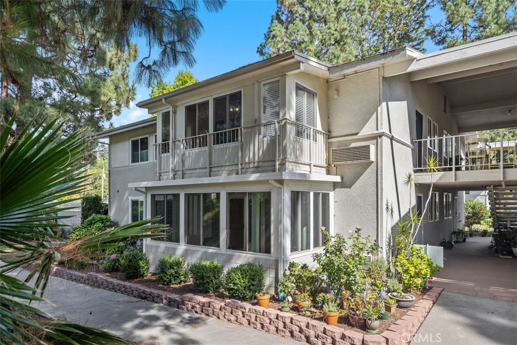 Welcome to this delightful upstairs "CASA BLANCA" unit located in the serene 55+ community of Laguna Woods. This home has a nice curb appeal, featuring lush greenery out front that invites you in with its warm and welcoming atmosphere. The unit features energy-efficient double-paned windows throughout, ensuring a comfortable and tranquil environment. Enjoy your morning coffee in the enclosed patio off the living room, a perfect spot for relaxation. (APPROX. 8 by 20), which is not included in the square footage. Additionally, it can serve as a crafts room, office, and more! The master suite can accommodate king-size furniture. You will love the convenient location, right next door to Clubhouse three, with easy access to Popular Amenities like Clubhouse 1, Medical Facilities, Shopping, restaurants, and more! There is a large parking lot for guests, and if you have a second car, you can also park there. The carport is conveniently located close by with storage. Add all this to the amenities offered by Laguna Woods Village. You have a winning combination - 27 27-hole championship golf courses or the 9-hole executive par three courses, tennis, paddle tennis, lawn bowling, two fitness centers, seven clubhouses, five swimming pools, an equestrian center, gardening opportunities, an art studio, a world-class woodshop, over 200 clubs and organizations, ensuring you will never get bored here! Additionally, enjoy free bus transportation throughout the community, nearby shopping, and convenient bus trips. Additionally, a very economical RV storage area is available for parking your RV. Country Club Living is at its BEST and just approximately 6 miles from beautiful Laguna Beach! There is something for everyone. SEE VIRTUAL TOUR* CARPORT #356 SPACE 1