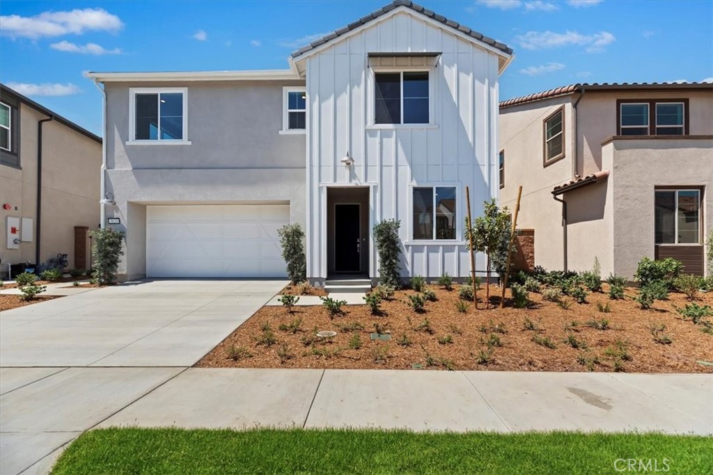 Newly opened Tri Pointe Homes Sawyer community within the gates of Bedford. New construction single-family residence with a backyard and driveway This floorplan features expansive first floor Great Room/Kitchen/Dining areas complemented by a Bedroom and Bathroom, while a large bonus room, Primary Suite and secondary Beds await upstairs.