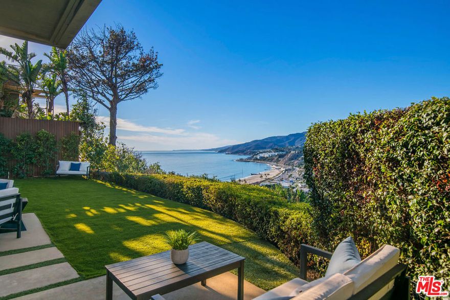 Location + views = perfection!  Located in the Palisades bluffs, walking distance to the beach, schools and Caruso Palisades Village this updated mid-century modern is the perfect family home.  One of only a handful of homes on the "rim", you will wake to the sunrise in Santa Monica and end your days with spectacular sunsets over Malibu.  Modern kitchen opens to great room and dining area with gorgeous mountain to ocean views from your picturesque backyard.  Large primary suite on the main floor with sitting room and direct ocean views.  The main floor also offers a second en suite bedroom with private entrance and views to the ocean by Santa Monica.  On the second level are 3 family bedrooms including one with a wrap-around terrace,  and a media/family room big enough for pool table or gym.  The rooftop deck is perfect for sunset entertaining with 360 degree views!  This home offers the quintessential California lifestyle within a one-of-a-kind location.