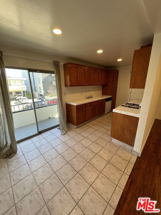 FOR ALL SHOWING REQUESTS, PLEASE CONTACT 323-997-7397. Welcome to 3707 Kelton Ave #3, a beautifully updated 1-bedroom, 1-bath apartment in the heart of Palms offering the perfect combination of comfort, style, and convenience. This light-filled home features an open-concept layout with sleek recessed lighting, central heat, and individual A/C units in each room for year-round comfort. Enjoy the convenience of an on-site washer and dryer, a dedicated gated parking space, and the security of a gated entry in a friendly, walkable neighborhood. Perfectly situated just minutes from Downtown Culver City, you'll have trendy restaurants, boutique shopping, and entertainment at your fingertips, along with quick access to the 405 and 10 freeways for easy commutes to Santa Monica, Westwood, or Downtown LA. The Metro is only 5 minutes away, connecting you effortlessly to the rest of the city. Close to parks, grocery stores, and local cafes, this modern Palms gem is the ideal home for those seeking style, comfort, and prime Westside living.