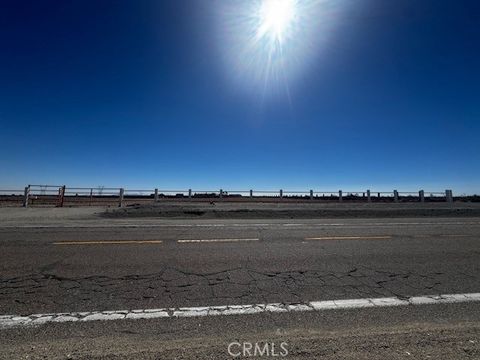 Photo of 16025 Sheep Creek Rd, Phelan, CA 92371 (MLS # IG25185682)