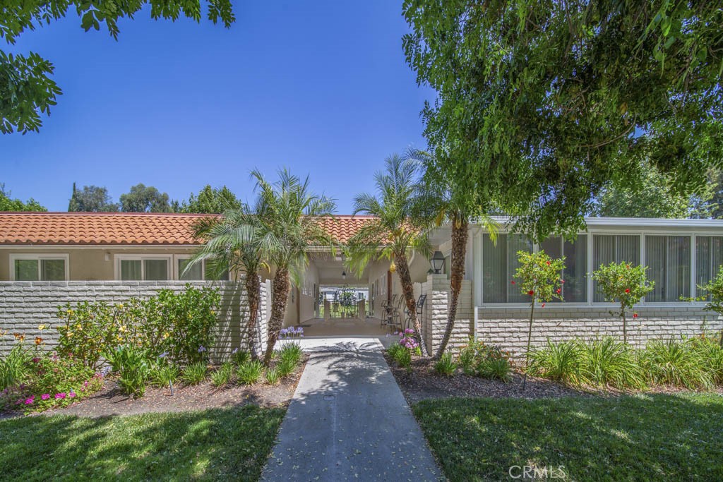 WELCOME HOME to this charming 2bd 2ba Casa Linda end unit with no stairs in the highly desirable 55+ community of Laguna Woods Village! This home features dual-pane windows throughout, smooth ceilings, recessed lighting, and upgraded flooring. The living room has a split unit for efficient heating and cooling, and access to the large balcony from the sliding door. The kitchen has been nicely upgraded with newer appliances, granite countertops, and a Blanco sink. There are ceiling fans in the dining room and both bedrooms. The large primary bedroom has a wall-mounted A/C unit for added comfort. The primary bath has been upgraded with washer/dryer conveniently located behind folding doors, a unique storage closet, and the walk-in shower has been upgraded with tile. The spacious guest bedroom provides direct access to the balcony, the perfect spot to enjoy your morning coffee or relax with evening breezes. Nestled within Laguna Woods Village, you’ll also enjoy resort-style amenities including 7 clubhouses, 5 pools, 3 fitness centers, golf, pickleball, tennis, lawn bowling, equestrian facilities, over 250 social clubs, and much more—all in a secure, beautifully landscaped community.