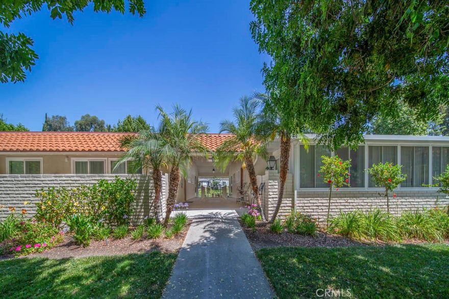 WELCOME HOME to this charming 2bd 2ba Casa Linda end unit with no stairs in the highly desirable 55+ community of Laguna Woods Village! This home features dual-pane windows throughout, smooth ceilings, recessed lighting, and upgraded flooring. The living room has a split unit for efficient heating and cooling, and access to the large balcony from the sliding door. The kitchen has been nicely upgraded with newer appliances, granite countertops, and a Blanco sink. There are ceiling fans in the dining room and both bedrooms. The large primary bedroom has a wall-mounted A/C unit for added comfort. The primary bath has been upgraded with washer/dryer conveniently located behind folding doors, a unique storage closet, and the walk-in shower has been upgraded with tile. The spacious guest bedroom provides direct access to the balcony, the perfect spot to enjoy your morning coffee or relax with evening breezes. Nestled within Laguna Woods Village, you’ll also enjoy resort-style amenities including 7 clubhouses, 5 pools, 3 fitness centers, golf, pickleball, tennis, lawn bowling, equestrian facilities, over 250 social clubs, and much more—all in a secure, beautifully landscaped community.