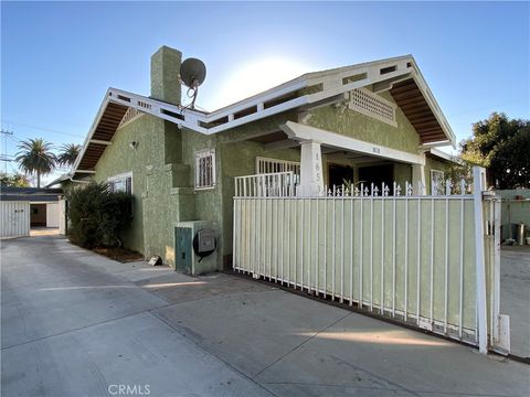 Photo of 1650 W 39th Place, Los Angeles, CA 90062 (MLS # RS26048897)
