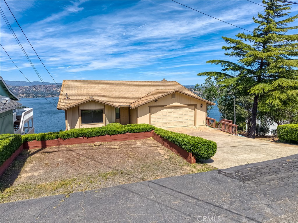 Welcome Home to your new spacious Custom-Built home located in the Kelseyville Riviera Community with breathtaking views of Clear Lake, Mount Konocti and backdrops of surrounding hills, vineyards and amazing sunsets. From the time you enter, you will be greeted by some of the most amazing views of Clear Lake. This approximately 3,450 SF home features a grand open floor plan with 4 bedrooms & an extra room for your office, or "use your own imagination" and 3 full bathrooms ... perfect for entertaining large get-togethers or simply relaxing by your wood burning stove for quiet evenings at home. The living room & dining room lead to attached decks with views. The spacious kitchen includes a snack bar & walk-in pantry. On the first floor, you will find a front bedroom that faces the courtyard and a full bathroom with tub/shower. The lower level includes the office space with a private deck. There is a guest bathroom, and 3 more bedrooms. The primary bedroom has a private balcony to wake up to our various bird species and wildlife and enjoy your morning beverages. The en suite includes a soaking tub, walk-in shower and double-sink vanity with lots of storage. From the 4th bedroom, there is an attached room that could be used as a workshop or storage space. This could be your next primary home, vacation home or possible investment rental property. This beautiful home is located close to the Riviera Shopping Plaza, restaurants, schools and medical facilities. Come see and enjoy!
