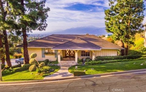Photo of 1344 S Sandy Hill Drive, West Covina, CA 91791 (MLS # CV26080422)