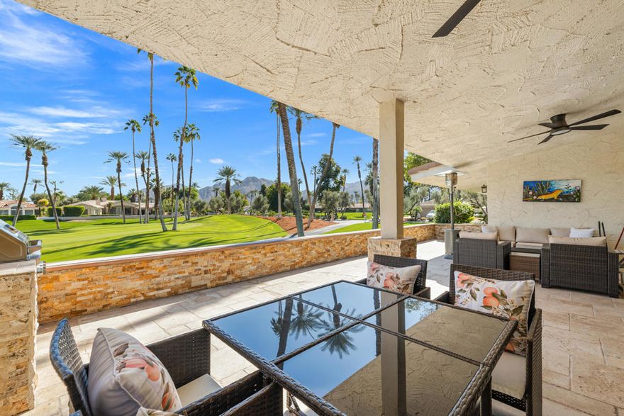 Incredible 3 bedroom, 3 bath home on the prestigious Desert Horizons Country Club. Panoramic views of the Mountains and golf course.Many upgrades include an OWNED SOLAR SYSTEM, a new electrical panel, updated kitchen and bathrooms, New AC units in 2024, New duct work, closet organizers, new door hardware, motorized shades, low maintenance landscape with solar lighting and much more.  Travertine flooring throughout the home and new porcelain tile flooring in the bedrooms and baths. The large gourmet kitchen is fit for a CHEF!  It has a wine cooler, built in Electrolux refrigerator/freezer, extended Kitchen counters, new faucet and lighting, 2 large pantries, Viking Range, under counter microwave, under sink water filtration system and under cabinet lighting. The large great room has vaulted ceilings floor to ceiling windows and a cozy fireplace with mantel.  The extended, elevated and walled in patio area (by 700 Sq. ft.) gives this home a super large outdoor area for relaxing or entertaining. New exterior patio fans with lights and a built in custom BBQ with flagstone and lighting complete the total look as you watch golfers on the 3rd Green. The garage has a new Split AC unit with controller .  There is a golf cart garage and built in storage in addition to the 2 car garage. Desert Horizons has an 18 Hole private golf course, a newly renovated club with a spectacular dining facility, State of the Art Fitness center, tennis and pickleball courts and more.