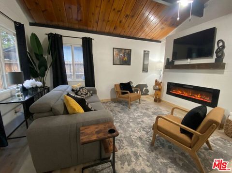 Photo of 972 Pinon Lane, Big Bear City, CA 92314 (MLS # 26860507)