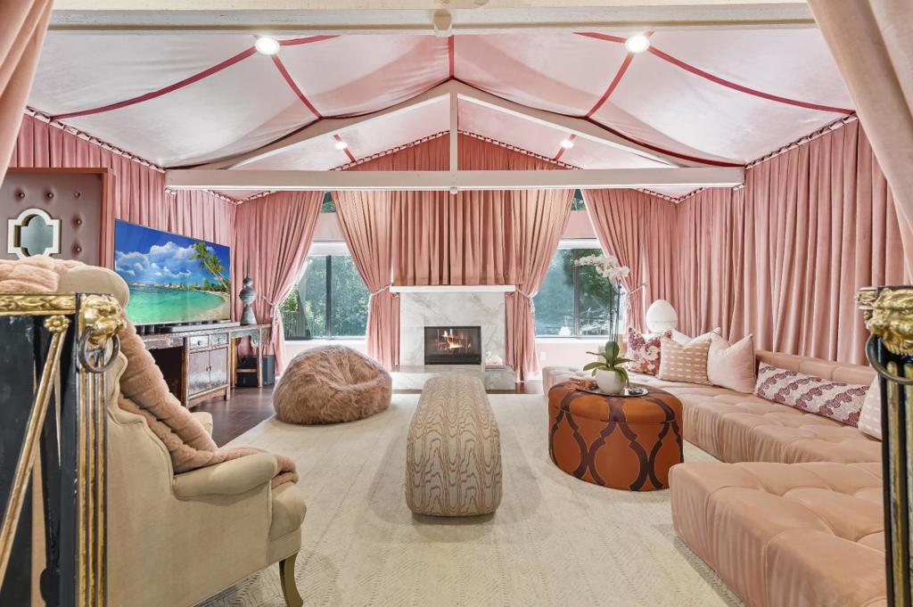 Prestigious & Private Los Altos Hills Estate with Ken Fulk Designed Interiors. This exceptionally private Los Altos Hills estate offers refined living in one of Silicon Valleys most elite communities. Set in a serene, park-like setting, the property blends timeless California architecture with sophisticated interior design touches from world-renowned designer Ken Fulk, creating a residence that is both stylish and inviting. Tucked away on an expansive lot surrounded by natural beauty, the home features light-filled living spaces, soaring ceilings, and a seamless indoor-outdoor flow. The Ken Fulk designed interiors showcase curated finishes, bespoke details, and elegant materials that elevate everyday living into a truly luxurious experience. Highlights include a gourmet kitchen with pro-grade appliances, spacious formal and casual living areas, and a primary suite retreat designed with both comfort and glamour in mind. Outdoor spaces offer multiple terraces, lush landscaping, and abundant privacy for entertaining, relaxation, or future enhancements. Perfectly located just minutes from downtown Los Altos, Palo Alto, and Stanford, with top-rated schools and convenient access to major tech campuses, this estate provides the ideal balance of privacy, natural beauty, connectivity.