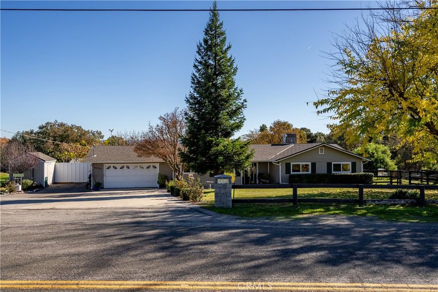Welcome to this ideal country home offering 1702 sf, 3 bedrooms and 2 bathrooms, perfectly situated on 2.8 usable acres. From the moment you arrive, you’ll appreciate the lush landscaping and well-maintained setting that create an inviting first impression. A brick paver walkway leads to the beautiful front door and into a home filled with warmth and charm. Inside, you’ll be pleasantly surprised by the open living room featuring a wood-burning stove, elegant crown molding and a large picture window that fills the space with natural light while showcasing peaceful backyard views. Beyond the living room, the main living area continues the welcoming feel. The family room also features crown molding and a large French door that perfectly frames the stunning property beyond. The family room flows seamlessly into the dining area and delightful kitchen, complete with granite countertops, abundant cabinetry and stainless steel appliances. On the opposite side of the home, you’ll find two spacious guest bedrooms, a main bathroom and the private primary suite. The primary bedroom offers two closets, a slider leading directly to the backyard and an updated ensuite bathroom. Step outside and discover a fantastic covered back patio, perfect for relaxing or entertaining, along with a spa where you can unwind and soak away the day. Following the driveway toward the back of the property reveals the crown jewel: a large stable with two stalls, tack room, power and water. Adjacent is an approximately 1000 sf barn/workshop with power and lighting, plus an open area ideal for exercising horses. The property also features a large fenced pasture with a shelter equipped with power and water, perfect for horses or other 4 legged companions. In addition to its impressive amenities, the location is exceptional. Situated at the south end of Atascadero, the home offers quick and easy freeway access, making travel throughout North and South San Luis Obispo County a breeze. If you’ve been searching for a property that offers the serenity of country living while being just minutes from town, this is the one. Don’t sit on this opportunity—schedule your showing today. Please review the Virtual Tour for additional information.