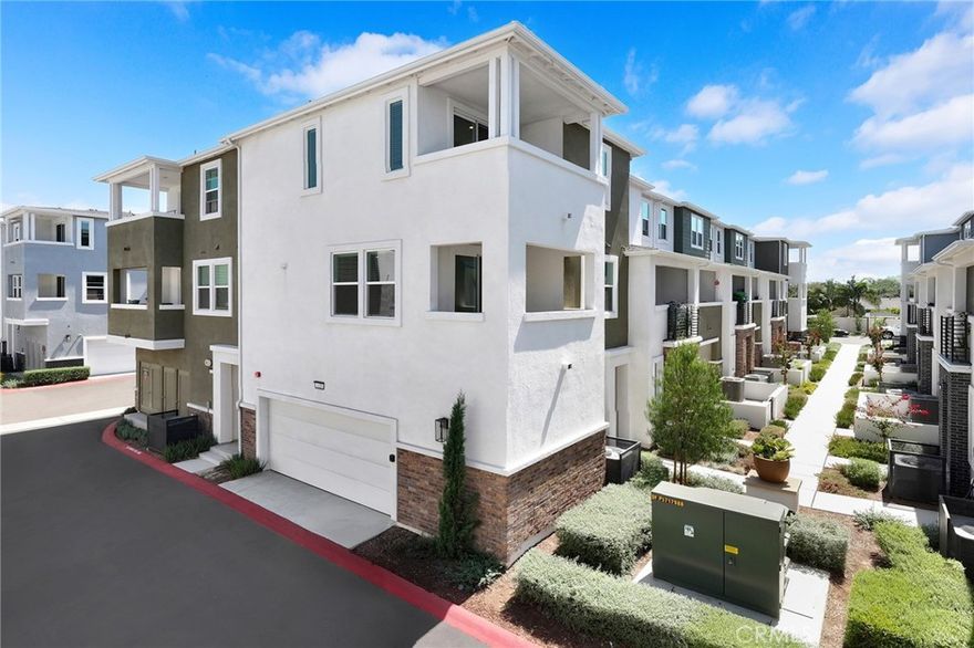 Low tax rate and low HOA. Paid off solar system helps save energy costs. This stunning 2024 built end unit condo is filled with natural light throughout. It offers 2 bedrooms and 2.5 bathrooms with a thoughtfully designed layout:

First Floor: Oversized side-by-side two-car garage with additional storage space. Second Floor: Upgraded kitchen featuring white cabinets, white ice quartz countertops, and luxury appliances. The spacious living room flows seamlessly into the dining area with access to a relaxing balcony, plus a convenient half bath for guests. Third Floor: 2 bedrooms and 2 bathrooms, the spacious master suite with a walk-in closet, dual vanity sinks, and a private balcony. The secondary bedroom is served by a full bath, along with a laundry closet equipped with washer and dryer.

Conveniently located near shopping, restaurants, banks, schools and with easy access to freeways I-10 and 605. Come to see this charming home.