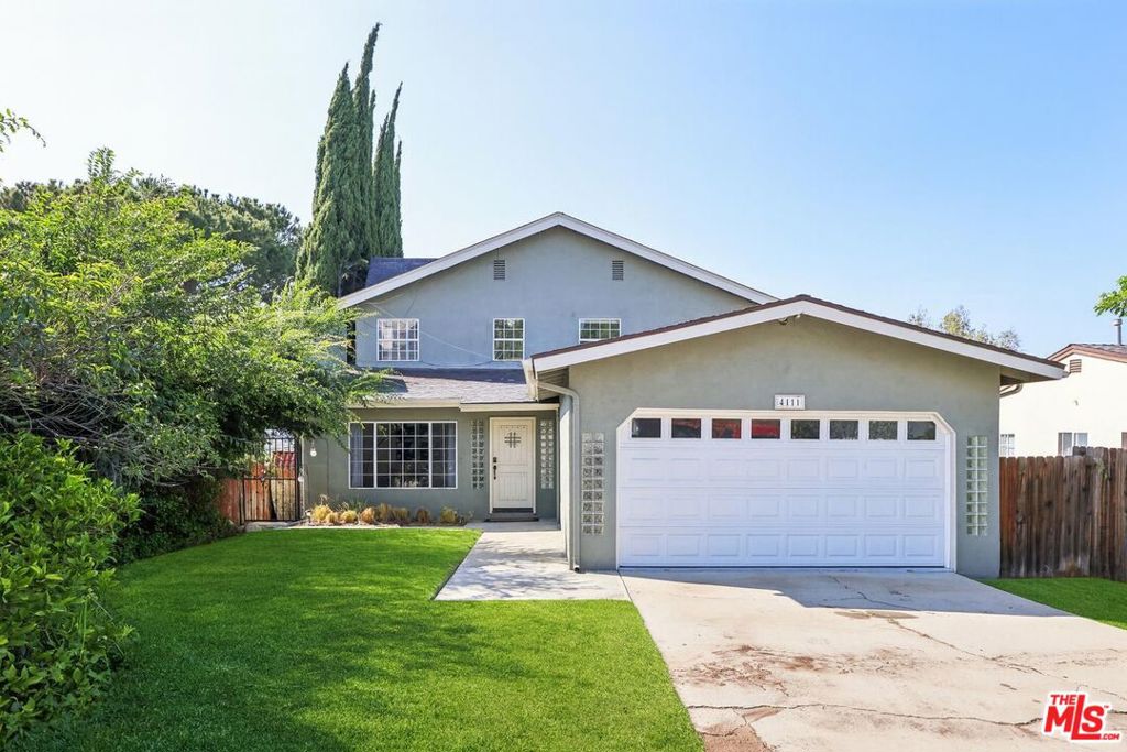 High in the hills of Glassell Park, this private retreat combines modern design, everyday comfort, and sweeping panoramic views. Offering 4 bedrooms, 4 bathrooms, and nearly 2,800 sq. ft. of thoughtfully crafted living space, this two-story home captures the essence of California hillside living. The sun-filled, open-concept main level is designed for both relaxation and entertaining. The living room features a cozy fireplace, custom built-in bookshelves, and a sleek built-in bar. French windows frame hil lside vistas, while recessed lighting, rich laminate and tile flooring, and abundant natural light add warmth and sophistication.At the center of the home, the chef's kitchen is equipped with Viking stainless steel appliances, including a double oven, six-burner range with griddle, and dishwasher. Warm wood cabinetry and a charming built-in breakfast nook make the space both functional and inviting. Just beyond, the formal dining area opens to a private balconyperfect for morning coffee or sunset meals with endless views. Upstairs, the primary suite offers a private retreat with its own balcony overlooking mountains and city lights. A spacious walk-in closet and spa-inspired ensuite with dual sinks, soaking tub, and glass shower complete the space.The lower level includes two additional bedrooms, a full bathroom, powder room, and a dedicated laundry room. A flexible bonus room can serve as a home office, gym, or studio.Outdoors, a secluded backyard surrounded by mature trees and greenery provides a tranquil escape. The open-air patio with fire pit invites stargazing, gatherings, or quiet evenings in nature. Stunning city and mountain views are visible from nearly every vantage point. Additional highlights include a modern Ecobee smart thermostat and a convenient location close to Glassell Park favorites like Lemon Poppy Kitchen, Habitat Coffee, and Dunsmoor. Highland Park's Hippo, Kitchen Mouse, and Highland Park Bowl are just minutes away, with everyday essentials such as Target, Home Depot, Sprouts, and Whole Foods 365 nearby. Easy freeway access (2, 5, and 134) connects you to DTLA, Pasadena, Silver Lake, and beyond.This home offers not only comfort and style but also a lifestyle of beauty and balance in one of the Eastside's most sought-after hillside neighborhoods.