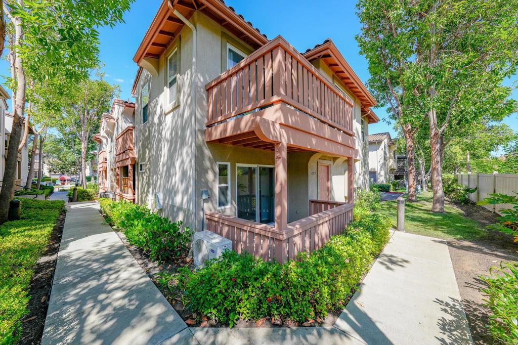 Spacious 3-bedroom, 2-bathroom end-unit condo located in the Serrano neighborhood of Rancho Carrillo. This home includes an attached two-car garage, wood floors throughout, a brand-new central AC system, ceiling fans for air flow, upgraded kitchen appliances, and ample storage. The first-floor primary suite features a private outdoor sitting patio. Upstairs, the kitchen with upgraded appliances opens to a dining area and large private balcony through a dual-pane sliding glass door. A bright and open living room with abundant windows connects to two additional bedrooms and a full bathroom—perfect for versatile living or a home office. Community amenities include a pool, green spaces, walking paths, seating areas, and guest parking. Conveniently located off Palomar Mountain Road, with easy access to Bressi Ranch, Encinitas, Carlsbad beaches, and Carlsbad Business Park, as well as shopping, dining, and golf. Rental Terms: 12-month lease, $3,400 security deposit, minimum 740 credit score, income requirement of 3x monthly rent. No pets, no smoking.