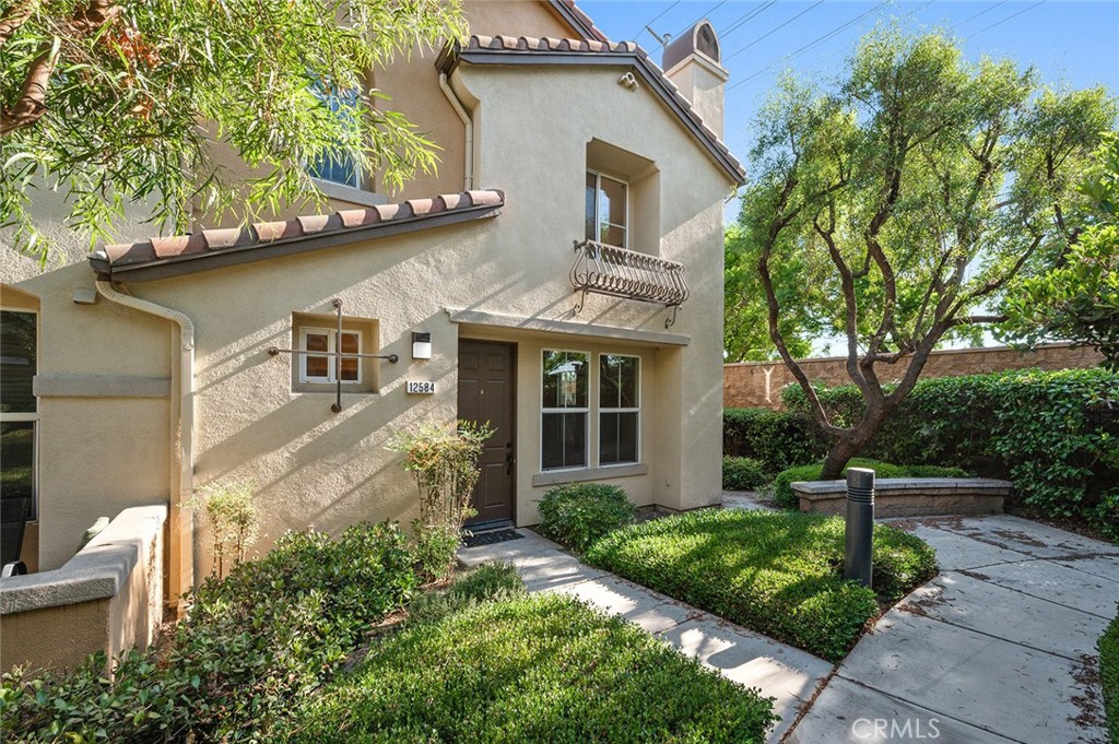 This end-unit condo located in the heart of Eastvale offers the perfect blend of modern upgrades and comfortable living. One of the largest floor plans within the community with 4 bedrooms, a Loft and 2 and a half bathrooms. The open-plan living room is perfect for relaxation and entertaining, with large windows allowing for ample natural light. The modern kitchen includes a breakfast bar, built in microwave and granite countertops. The dining area flows effortlessly from the kitchen with access to a private patio. The primary bedroom has a walk-in closet, dual sinks, a walk in shower & separate tub. The versatile loft offers an ideal spot for a home office or a den. Upstairs laundry room and an attached 2 car garage. Residents enjoy access to a state-of-the-art recreation center, featuring a refreshing swimming pool, spa, outdoor fireplace, play area, sport/basketball court, as well as numerous BBQ areas with picnic tables. Close to shopping, dining and Eastvale Gateway, with nearby access to the 15, 91, and 60 freeways.