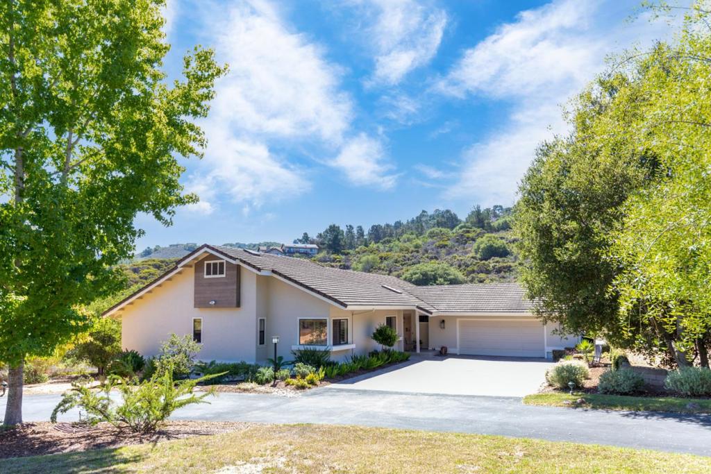 Enjoy living in the sun belt of the Monterey Peninsula with beautiful mountain views. Sought after one story living and recently fully remodeled. Chef's kitchen with a double island, Subzero. custom cabinetry, stone countertops, and commercial range plus built in oven and microwave. Three bedrooms and two and one half baths with a dual walk in closet for the master suite all on one floor. Two acres of land affords a private oasis with expansive partially covered wrap around deck and circular driveway. Views to the mountains to the south provide an oasis from the hustle and bustle though close to all of the amenities the Monterey Peninsula has to offer. Come visit and see for yourself the wonderful climate and ease of access to all of the amenities that makes the Monterey Peninsula so special.