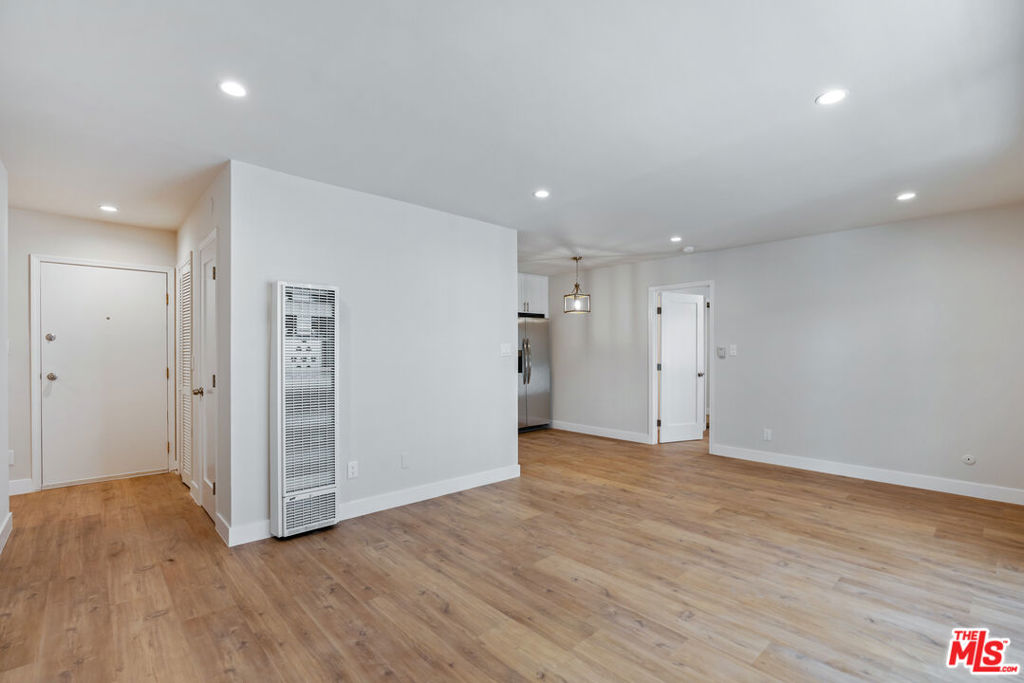 Completely remodeled 3-bedroom, 2-bathroom unit featuring a sleek, modern design with elegant touches throughout. This bright and spacious apartment offers a wonderful array of amenities to enhance your living experience. The updated kitchen boasts a full stainless steel appliance package, including a stove, refrigerator, microwave, and dishwasher. You'll appreciate the recessed lighting , wall AC's, and mirrored closets in each bedroom. Beautiful hardwood floors flow seamlessly throughout the entire unit, and for added convenience, a washer and dryer are included within the apartment. This unit enjoys a prime central location, providing easy access to major shopping centers, fine dining establishments, and the renowned entertainment studios of Culver City, as well as the beautiful beaches of Santa Monica and Venice. Commuting is a breeze with convenient access to the 10 and 110 freeways, the Metrolink Transit, and various bus lines. Whether you're heading to the beach cities, Mid-Wilshire, or Downtown Los Angeles, this location offers unparalleled convenience.