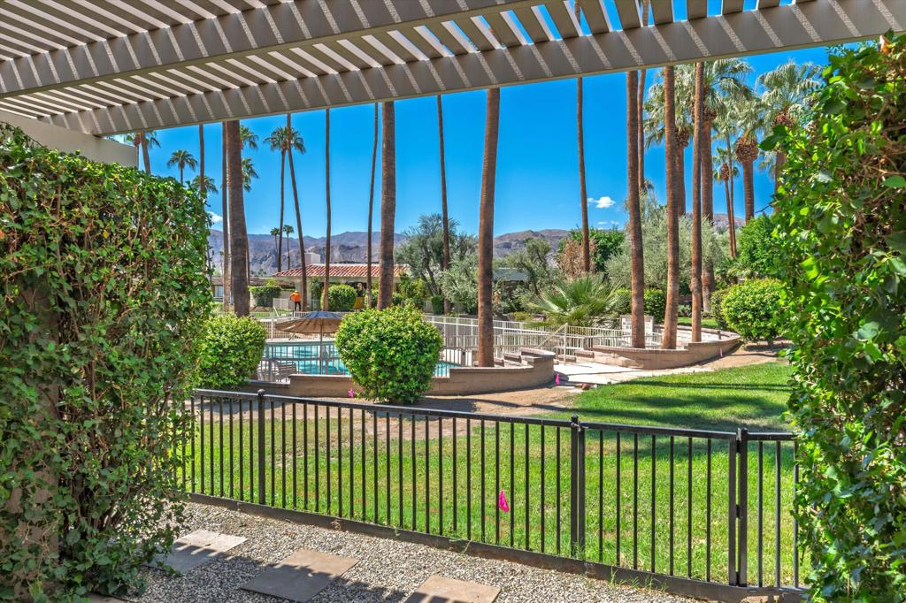 Everything you've been looking for in a serene and private desert retreat. This late Phase 8 - Shaugnessey floor plan with private circular driveway is an incredible value. You'll find timeless design in this light bathed property, ideal for those looking for a lock and leave desert home. Designer ceramic tile flooring throughout, enlarged coffered and illuminated entry with smooth plaster and recessed lighting. Highly upgraded kitchen including top of the line stainless appliances, shaker cabinets and honed granite countertops. A stunning master bathroom with oversized walk in shower. There are exceptional finishing touches throughout the entire property. Expansive primary bedroom retreat with office nook can also be used as private sitting area. New HVAC units and 30 panels of owned solar! Enjoy the convenience of electronic window shades and a wonderful lounge patio in the rear of the property. Southwest facing living areas have fabulous mountain views as a backdrop across a lush greenbelt creating a tranquil home environment. Only a few steps from a large recessed community salt water lap pool and spa! The unique outside SW entertaining area includes an extended side yard that has been walled off for additional privacy and a larger outdoor space, thoughtfully designed with synthetic turf, poured in place pavers and zero maintenance Alumawood Trellis. World class Golf, tennis, pickleball, fitness, dining and exclusive events are all available at The Springs Country club. With the $16 million dollar Desmond Muirhead-designed golf course renovation due for completion in November of 2025 - it's time to come see The Springs- where Legacy meets the future!