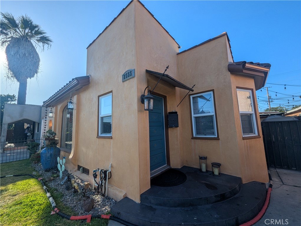 Good things really do come to those who wait—and 2555 Cass Place in Huntington Park is proof! This charming Spanish-style home is packed with character and thoughtful updates. From the classic wrought iron fencing to the smooth stucco, updated windows, and copper rain gutters, it’s clear this home has been more than cared for—it’s been adored. While the sale requires a bit of patience, the reward is worth it: the chance to own a truly special home with endless potential. Even the garage has been converted (without permit) into a living space, opening the door to a variety of possibilities.
If you’re willing to wait, you could be the next proud owner of 2555 Cass Place—a home that offers charm, opportunity, and a whole lot of heart.