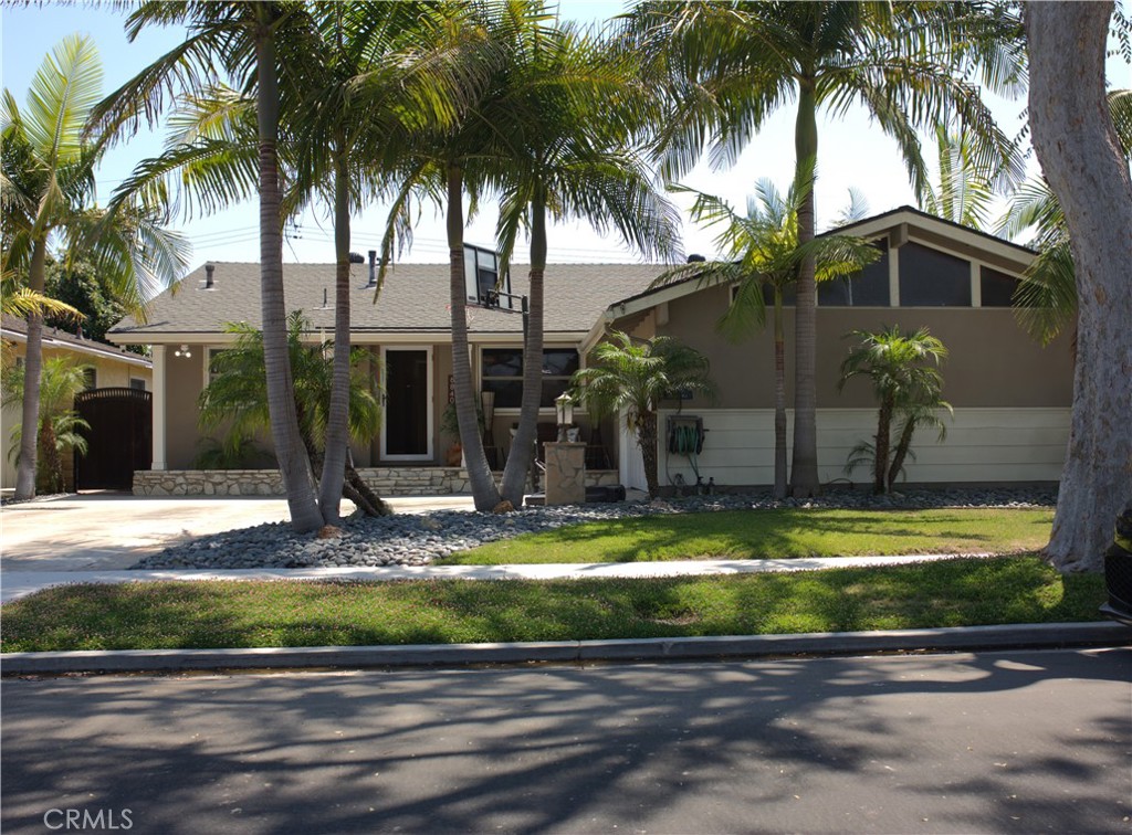 Welcome to your new home in a desirable neighborhood of Long Beach! This inviting and well-maintained property offers the perfect blend of comfort, space, and convenience ideal for families or individuals seeking a cozy and functional living environment. Step inside to find three spacious bedrooms and two full bathrooms, complemented by both a comfortable living room and an additional family room, perfect for entertaining or relaxing. A built-in bar adds a touch of character, while the private backyard with a pool creates a refreshing oasis for those warm Southern California days. A two car garage provides secure parking and additional storage. Nestled in a vibrant community, you'll enjoy close proximity to a local favorite restaurant and several department stores, ensuring shopping and dining are always within easy reach. Don't miss out on this wonderful opportunity to live in one of Long Beach's most charming neighborhoods. Contact us today to schedule a private tour and see all that this lovely home has to offer