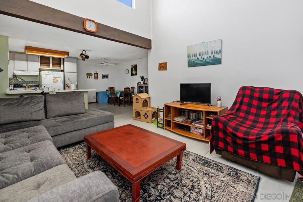 This light-filled, open-concept home features vaulted ceilings that enhance the sense of space and airiness. Enjoy serene views of a lush greenbelt and park-like setting from your private balcony, just off the spacious living room. Thoughtfully appointed with modern comforts, including in-unit laundry with full-size washer and dryer, central AC. Quiet, premium location within the community ensures peace and privacy. This home is also conveniently located near major freeways for easy access to all of San Diego. Community amenities include a resort-style pool and spa, BBQ area, and ample guest and street parking. With high owner occupancy, this complex qualifies for low down payment options. Comes with 2 assigned parking spaces. A rare find – don’t miss your opportunity to own this bright, spacious, and ideally located home!