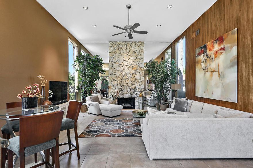 Located in the quiet neighborhood between El Dorado Street and Indian Wells Country Club sits this beautiful contemporary home, completely turn key furnished, for your 2023-2024 Seasonal visit to the Desert. One of the bedrooms is used as a office/study and the other two are large, primary bedrooms with ensuite bathrooms. The spacious elegant living room has high ceilings in a light filled space, lite from floor to ceiling from glass sliders across the back overlooking a large backyard. An entertainers delight, the yard features a large pebble tech pool and spa with lounge and sitting areas and an outdoor dining space. Also included, is a large gas BBQ and an outdoor fire pit for your enjoyment with beautiful mountain view. The well outfitted kitchen, dining room and adjacent den are all located on a separate side of the house. Shopping and dining in Palm Desert is located a short 10 minutes away. Come make this your Winter getaway this year!