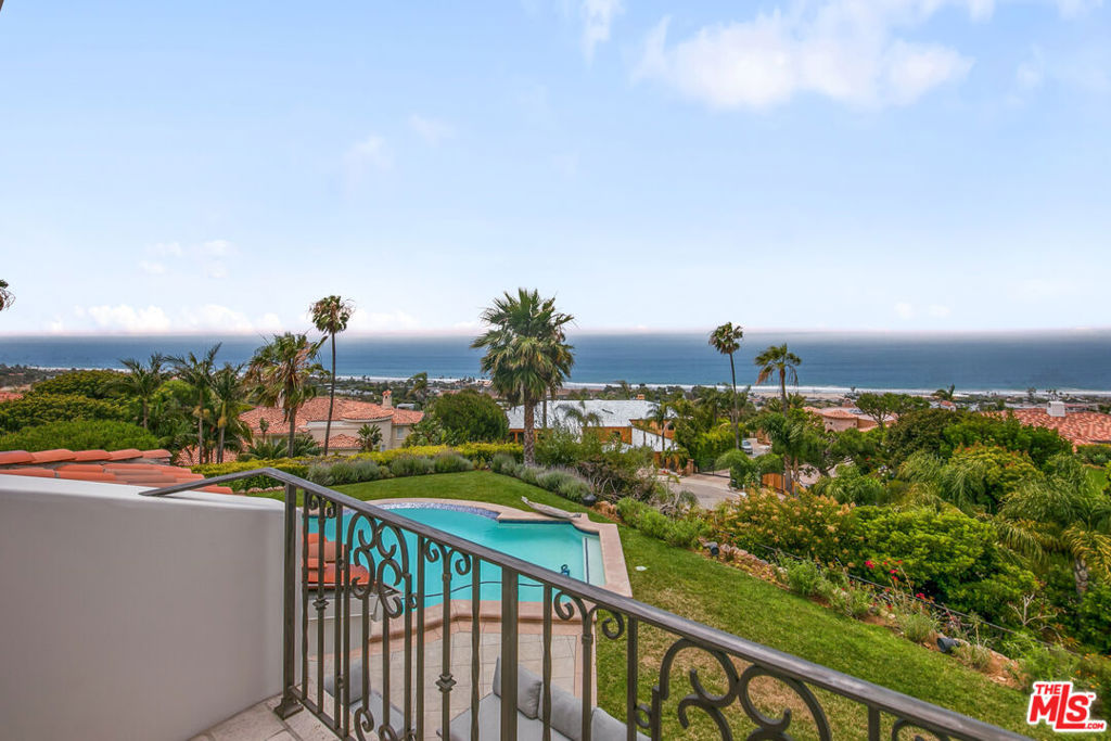 Spectacular contemporary Mediterranean-style estate with beautiful sweeping ocean, whitewater, island, canyon and mountain views. Located in the private and gated community of Sea View Estates just above Zuma Beach, this exceptional approximately 6500 square foot home offers generous living spaces with a fantastic flow. Features include an impressive two-story entry leading to three entertaining rooms comprised of a billiards/game room, living room with fireplace and formal dining room that easily seats 12. The combination of stone and hardwood floors sets the tone for the warmth of the home. A spacious granite gourmet kitchen with oversized center island, walk-in butler's pantry leads to a bright breakfast/lunch dining area with ocean views. The sun-filled family room with fireplace opens to the outdoor entertaining area with pool, spa, and lounging area perfect for soaking in the whitewater and coastline view. The large primary suite features a fireplace, private coastline view patio, large bath with spa tub, huge shower and vast closet. Five additional en-suite bedrooms provide ample spaces for family and guests. The 1.48 lush, beautifully manicured acres with heated pool/spa, large patio, BBQ and numerous outdoor sitting areas are perfect for lavish entertaining. This residence is located a golf cart's distance to local markets, restaurants, award winning schools and sandy Malibu beaches. Your Malibu resort awaits you.