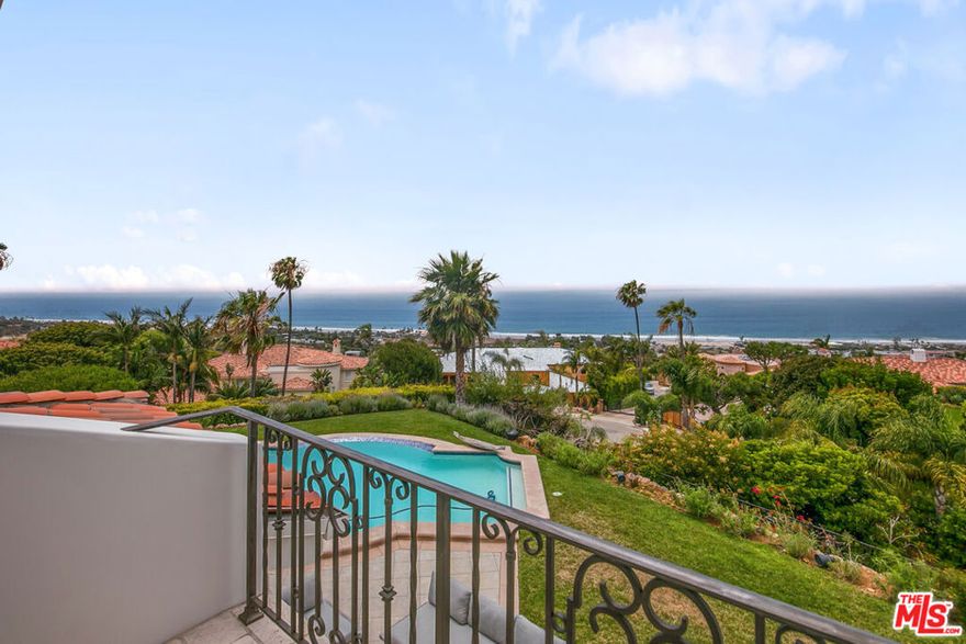 Spectacular contemporary Mediterranean-style estate with beautiful sweeping ocean, whitewater, island, canyon and mountain views. Located in the private and gated community of Sea View Estates just above Zuma Beach, this exceptional approximately 6500 square foot home offers generous living spaces with a fantastic flow. Features include an impressive two-story entry leading to three entertaining rooms comprised of a billiards/game room, living room with fireplace and formal dining room that easily seats 12.   The combination of stone and hardwood floors sets the tone for the warmth of the home.  A spacious granite gourmet kitchen with oversized center island, walk-in butler's pantry leads to a bright breakfast/lunch dining area with ocean views. The sun-filled family room with fireplace opens to the outdoor entertaining area with pool, spa, and lounging area perfect for soaking in the whitewater and coastline view.  The large primary suite features a fireplace, private coastline view patio, large bath with spa tub, huge shower and vast closet. Five additional en-suite bedrooms provide ample spaces for family and guests.   The 1.48 lush, beautifully manicured acres with heated pool/spa, large patio, BBQ and numerous outdoor sitting areas are perfect for lavish entertaining. This residence is located a golf cart's distance to local markets, restaurants, award winning schools and sandy Malibu beaches. Your Malibu resort awaits you.