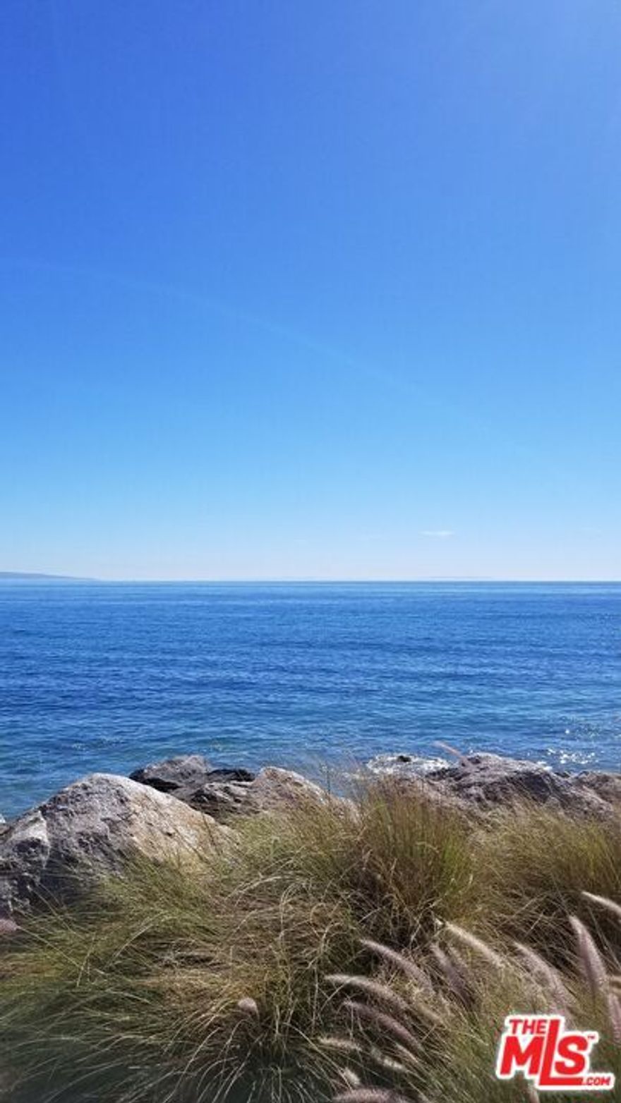 Here is your opportunity to buy it now! Massive Price Reduction! Seller wants it SOLD! This is truly a great opportunity to build your dream home on this upslope lot in Malibu with amazing ocean views!  Build a brand-new modern home with walking distance to Maestro's Ocean Club Restaurant.  This is the least expensive vacant lot in Malibu in such close proximity to the ocean.  Lots like this don't last long in this market! Buyer to verify all information and rely on their own investigations.  As listing agent for a plat map and go direct. Alternatively great investment to hold for future appreciation. Sold AS IS & WHERE IS. Drive by and MAKE OFFER. Check out the video and these photos!
