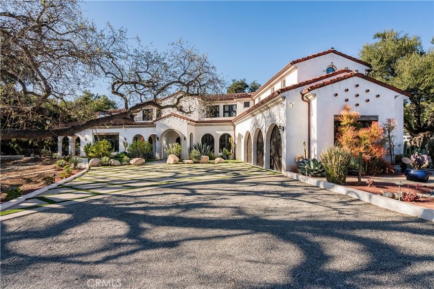 Welcome to your private oasis, a Spanish/Cuban-style estate nestled in the serene equestrian community of old Agoura, with breathtaking views. This expansive property offers luxurious living space, featuring 6 bedrooms and 7 bathrooms. Built in 2018, the residence is situated on a generous 2.25 acre lot, behind private gates providing ample space and privacy.  Step inside to discover hand-finished Barnwood flooring, expansive glass walls that invite natural light, and an open-concept layout.  The primary suite is a serene retreat with a spa-like ensuite and private balcony overlooking lush landscapes. High-end kitchen featuring Wolf range, Sub-Zero refrigerator/freezer, dual Wolf ovens, and Bosch dishwasher. Fully-automated smart-home features controlled exterior lighting, irrigation, motion-sensitive security cameras, pool control, music system. Beyond the home, an extraordinary outdoor experience awaits. Exterior offers an underground bunker w/electricity, sump, and ventilation, and loggia/yoga area. Spanning both sides of Chesebro Creek, this estate features a unique rope bridge leading to a private glamping retreat.  The resort-style grounds also include multiple lounging and entertainment areas, perfect for hosting guests or enjoying peaceful moments in nature.  Ample open space for horses with access to limitless riding, hiking, and biking trail.

Located just minutes from Malibu and the vibrant communities of Calabases and Westlake Village, this one-of-a-kind estate offers privacy, modern sophistication and an unmatched connection to nature.

Don't miss this rare opportunity to own a truly spectacular Agoura Hills retreat !!
